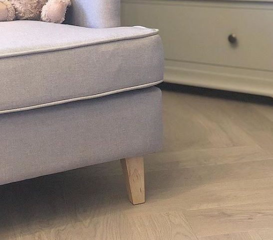 Maintain laminate flooring using furniture pads