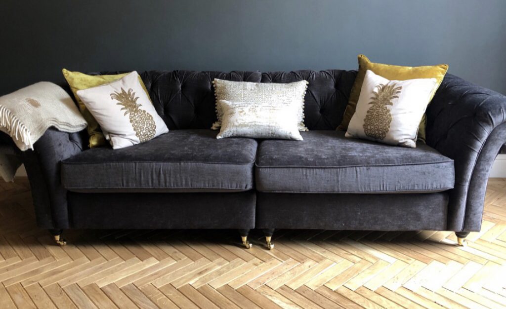 Herringbone Flooring with Velvet Upholstered Furniture