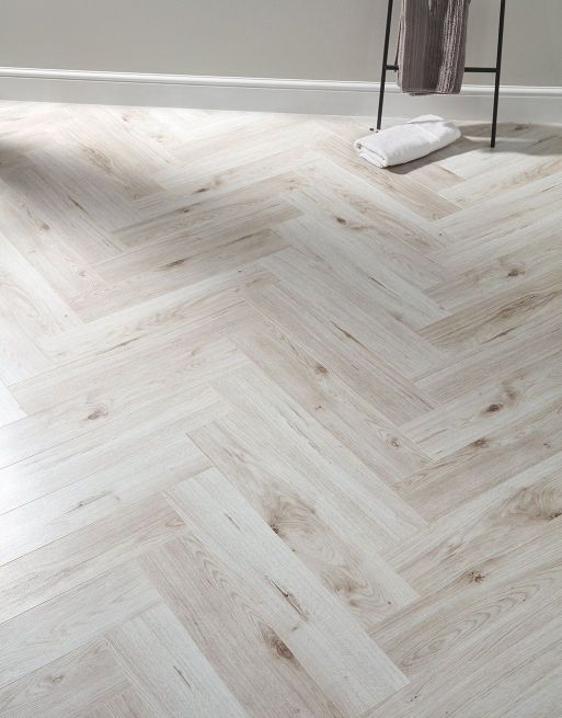 Summer interior trends - Herringbone Pearl Oak Laminate Flooring